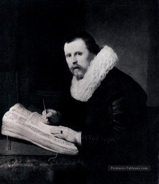 Rembrandt van Rijn œuvres - Jeune homme à son bureau portrait Rembrandt